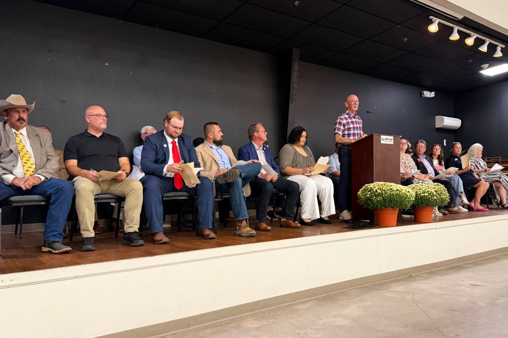 Carlisle Mayor Jon Plafcan, who is not running for reelection, speaks at the start of a candidate forum held in the city on Oct. 13. All photos: Michael Hibblen